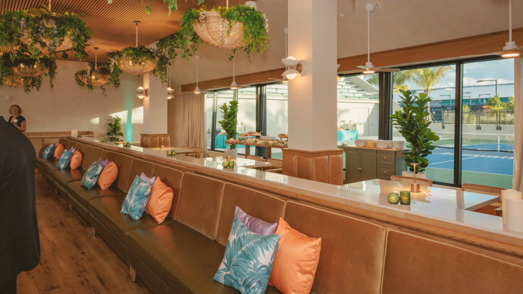 Private dining setup with long banquette seating and event layout at Florida Room Fort Lauderdale