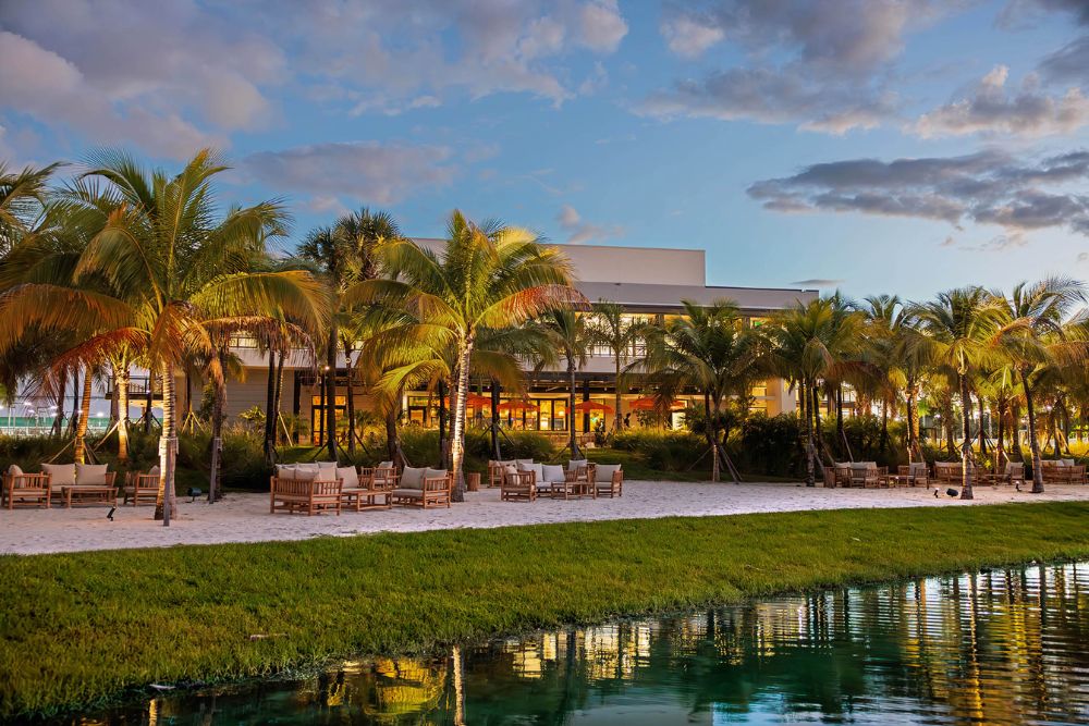 Florida Room lakeside restaurant in Fort Lauderdale overlooking the water at sunset.