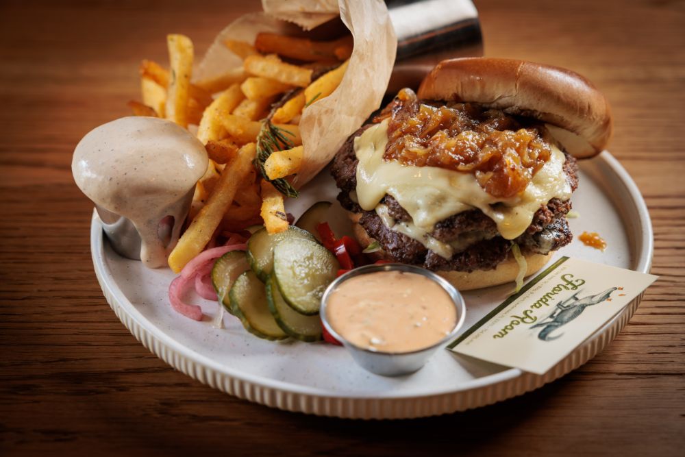 Scratch-made burger and fries at Florida Room quality ingredients restaurant in Fort Lauderdale.
